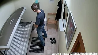 Young suppliant secretly filmed in public solarium